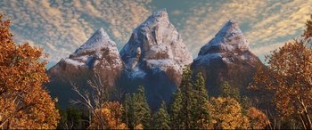 Movie still from “The Good Dinosaur” (2015), directed by Peter Sohn – A painting of a mountain with snow on top; Extreme Wide shot, Low angle