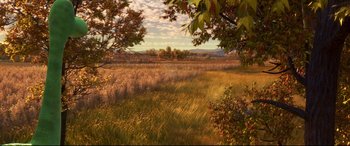 Movie still from “The Good Dinosaur” (2015), directed by Peter Sohn – An image of an open field in the middle of the day; Extreme Wide shot, High angle