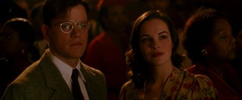 Movie still from “The Good Shepherd” (2006), directed by Robert De Niro – A man and a woman standing next to each other; Close Up shot, Low angle