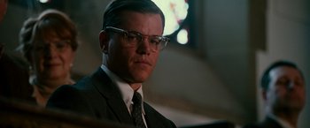 Movie still from “The Good Shepherd” (2006), directed by Robert De Niro – Matt damon in a suit and tie in a movie; Close Up shot, Low angle