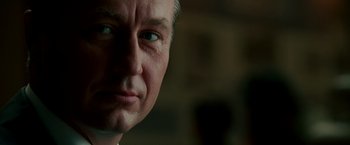 Movie still from “The Good Shepherd” (2006), directed by Robert De Niro – The face of a man with blue eyes; Close Up shot, Over the shoulder angle