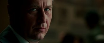 Movie still from “The Good Shepherd” (2006), directed by Robert De Niro – A man's face with blue eyes; Close Up shot, Over the shoulder angle
