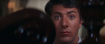 Movie still from “The Graduate” (1967), directed by Mike Nichols – A man's face in front of a mirror; Close Up shot, Low angle