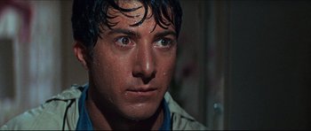Movie still from “The Graduate” (1967), directed by Mike Nichols – A man's face with water droplets on his face; Close Up shot, Low angle