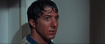 Movie still from “The Graduate” (1967), directed by Mike Nichols – A person with wet hair; Close Up shot, Low angle