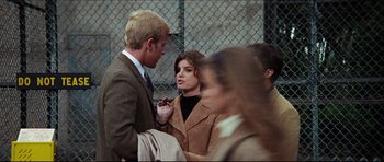 Movie still from “The Graduate” (1967), directed by Mike Nichols – A man and a woman are talking to each other; Medium shot, Over the shoulder angle
