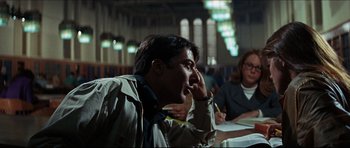 Movie still from “The Graduate” (1967), directed by Mike Nichols – A man sitting at a table in front of a woman; Medium shot, Over the shoulder angle