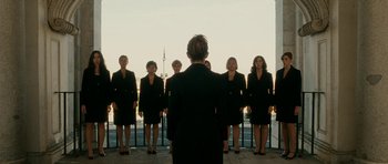 Movie still from “The Great Beauty” (2013), directed by Paolo Sorrentino – A group of women standing next to each other in black suits; Wide shot, Low angle