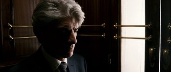 Movie still from “The Great Beauty” (2013), directed by Paolo Sorrentino – A man in a suit and a tie; Close Up shot, Low angle