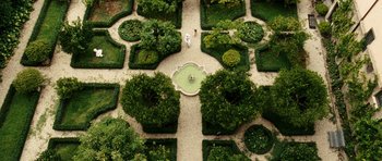 Movie still from “The Great Beauty” (2013), directed by Paolo Sorrentino – An aerial view of a formal garden with a fountain; Extreme Wide shot, Overhead angle