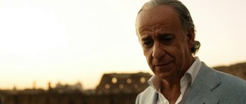 Movie still from “The Great Beauty” (2013), directed by Paolo Sorrentino – An older man is looking at the camera; Close Up shot, Low angle