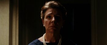 Movie still from “The Great Beauty” (2013), directed by Paolo Sorrentino – A person wearing a dress and pearl necklace; Close Up shot, Low angle