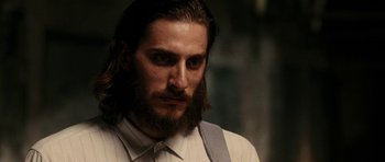 Movie still from “The Great Beauty” (2013), directed by Paolo Sorrentino – A man with long hair and a long beard; Close Up shot, Low angle