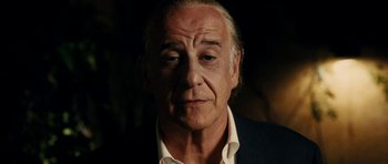 Movie still from “The Great Beauty” (2013), directed by Paolo Sorrentino – An older man in a white shirt and a black jacket; Close Up shot, Low angle