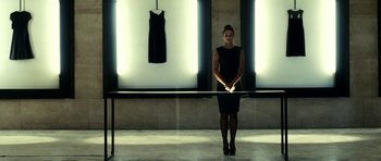 Movie still from “The Great Beauty” (2013), directed by Paolo Sorrentino – A woman in a black dress standing in front of a window; Wide shot, Low angle