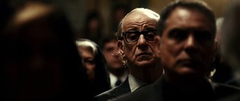 Movie still from “The Great Beauty” (2013), directed by Paolo Sorrentino – An old man with glasses is looking at the camera; Close Up shot, Over the shoulder angle