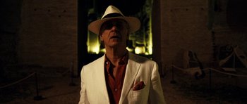 Movie still from “The Great Beauty” (2013), directed by Paolo Sorrentino – A man wearing a white suit and a white hat; Medium shot, Low angle