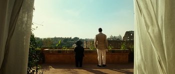 Movie still from “The Great Beauty” (2013), directed by Paolo Sorrentino – A man and a child looking out over a city; Wide shot, Low angle
