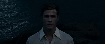 Movie still from “The Great Beauty” (2013), directed by Paolo Sorrentino – A man in a white shirt is looking at the camera; Close Up shot, Low angle