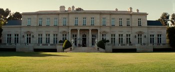 Movie still from “The Green Hornet” (2011), directed by Michel Gondry – A very big nice looking house with a lot of windows; Extreme Wide shot, Low angle