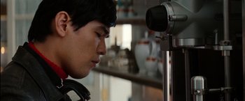 Movie still from “The Green Hornet” (2011), directed by Michel Gondry – A young man is looking at a video camera; Close Up shot, Low angle