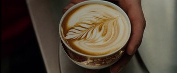 Movie still from “The Green Hornet” (2011), directed by Michel Gondry – A cup of coffee on a plate; Extreme Close Up shot, Overhead angle