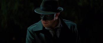 Movie still from “The Green Hornet” (2011), directed by Michel Gondry – A man wearing a hat and wearing a mask; Close Up shot, Low angle