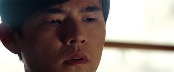 Movie still from “The Green Hornet” (2011), directed by Michel Gondry – A man's face with his mouth open; Extreme Close Up shot, Low angle