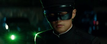 Movie still from “The Green Hornet” (2011), directed by Michel Gondry – A man wearing a black mask and a black hat; Close Up shot, Low angle