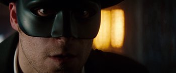 Movie still from “The Green Hornet” (2011), directed by Michel Gondry – A person wearing a batman mask; Close Up shot, Low angle