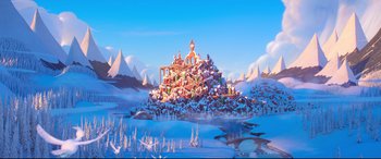 Movie still from “The Grinch” (2018), directed by Yarrow Cheney – An illustration of a mountain with a bunch of people on it; Extreme Wide shot, Low angle