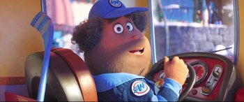 Movie still from “The Grinch” (2018), directed by Yarrow Cheney – A person in a car with a hat on; Close Up shot, Over the shoulder angle