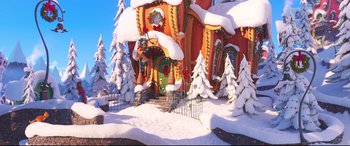 Movie still from “The Grinch” (2018), directed by Yarrow Cheney – An animated house with snow on the ground and trees around it; Extreme Wide shot, High angle