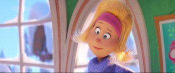 Movie still from “The Grinch” (2018), directed by Yarrow Cheney – A person's face in a cartoon; Close Up shot, Over the shoulder angle