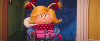 Movie still from “The Grinch” (2018), directed by Yarrow Cheney – A stuffed toy doll with blonde hair; Close Up shot, Over the shoulder angle