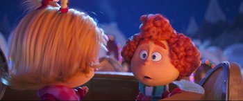 Movie still from “The Grinch” (2018), directed by Yarrow Cheney – The head of a doll in a mirror; Close Up shot, Over the shoulder angle