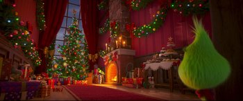 Movie still from “The Grinch” (2018), directed by Yarrow Cheney – An animated christmas scene with a fireplace and christmas tree; Extreme Wide shot, Low angle