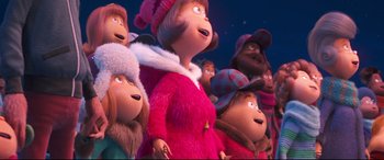 Movie still from “The Grinch” (2018), directed by Yarrow Cheney – A group of people standing next to each other; Medium shot, Low angle