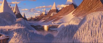Movie still from “The Grinch” (2018), directed by Yarrow Cheney – An animated scene of a waterfall in the middle of a snowy mountain range; Extreme Wide shot, High angle