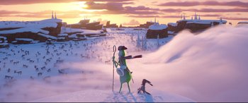Movie still from “The Grinch” (2018), directed by Yarrow Cheney – An animated scene of a person and a dog in the snow at sunset; Extreme Wide shot, High angle