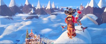 Movie still from “The Grinch” (2018), directed by Yarrow Cheney – A dog with a camera on his head standing on top of a hill; Extreme Wide shot, High angle