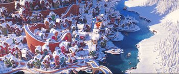 Movie still from “The Grinch” (2018), directed by Yarrow Cheney – An aerial view of a town with snow on the ground; Extreme Wide shot, High angle