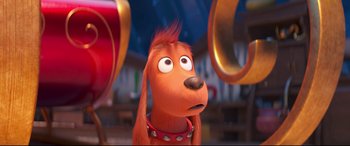 Movie still from “The Grinch” (2018), directed by Yarrow Cheney – A dog's face in a scene; Close Up shot, Over the shoulder angle
