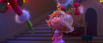 Movie still from “The Grinch” (2018), directed by Yarrow Cheney – A character from the movie , the croods; Medium shot, Over the shoulder angle