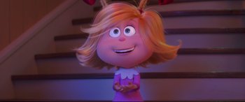 Movie still from “The Grinch” (2018), directed by Yarrow Cheney – A character's face in a cartoon; Close Up shot, Over the shoulder angle