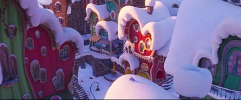 Movie still from “The Grinch” (2018), directed by Yarrow Cheney – An overhead view of a cartoon town with snow on the ground; Extreme Wide shot, High angle