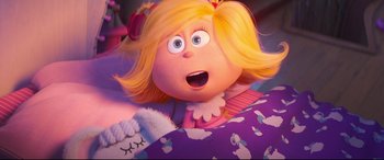 Movie still from “The Grinch” (2018), directed by Yarrow Cheney – A doll's face in a scene; Close Up shot, Over the shoulder angle