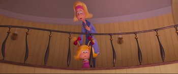 Movie still from “The Grinch” (2018), directed by Yarrow Cheney – A woman and a girl are standing on a railing; Medium shot, Over the shoulder angle