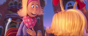 Movie still from “The Grinch” (2018), directed by Yarrow Cheney – A cartoon character's face; Close Up shot, Over the shoulder angle