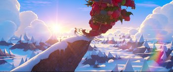 Movie still from “The Grinch” (2018), directed by Yarrow Cheney – An illustration of a mountain with a bunch of fruit hanging from it; Extreme Wide shot, High angle